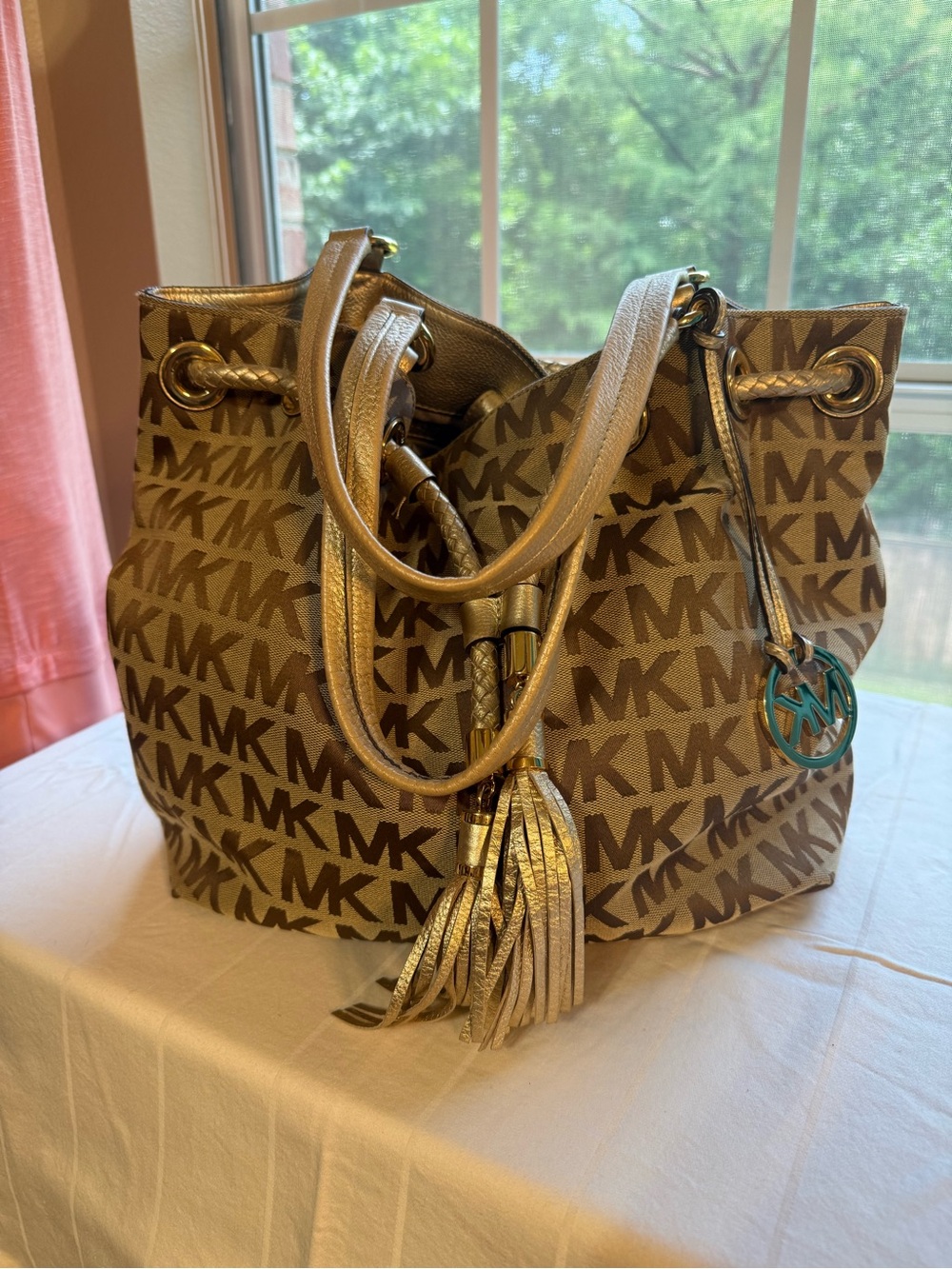 Michael Kors Large Jet Set Tan/Gold MK Logo Drawstring Tote used